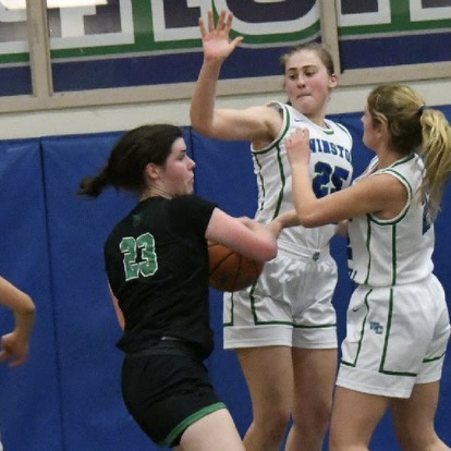 WCHS varsity basketball player Mena Hemphill blocks a shot from the opposing team. She sites Caitlin Clark as a big influence on and off the court. Screenshot