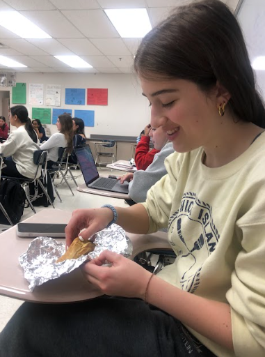 WCHS student uses binoculars in the hallway to see what classroom her new boy obsession is. 