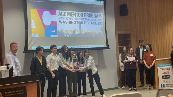 Catherine Qu and Lucinda Sun, WCHS’s Architecture Club President and Vice President, gather with the clubs other members to stand proudly with their first-place trophy from the ACE Competition in May 2023. Architecture helps them understand the engineering and practical design that comes into play when creating structures, like the Francis Scott Key Bridge.