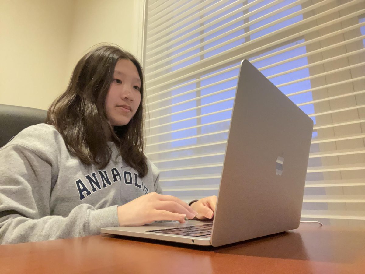 WCHS senior Allison Zhang completes her asynchronous learning work on April 22, 2024. She appreciates the flexibility of doing school work at home and on her own time. 