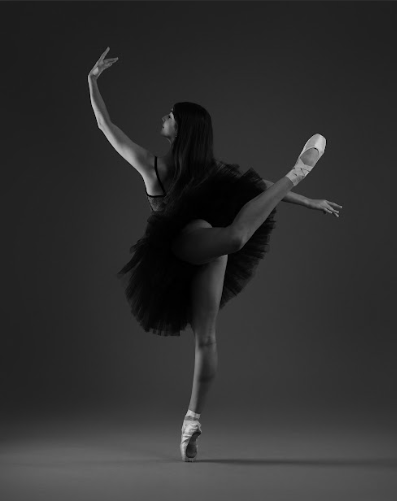  WCHS junior Juliette Mamalian perfectly executes an attitude derrière. This perfection comes from dancing her practicing seven days a week at the Maryland Youth Ballet. 