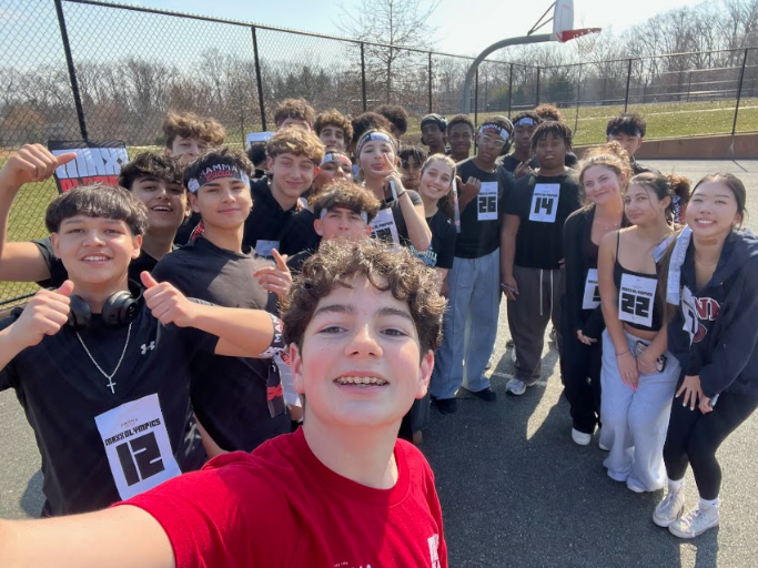 Benjamin Abergel and contestants of the Maxx Olympics get ready for a day of filming. The Maxx Olympics will air on YouTube on May 11, 2025.