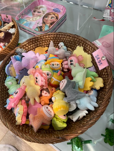 You can find Labubu styled trinkets everywhere, though mostly dupes. The beloved Pop Mart collectible has become a feature of stores and gift shops.