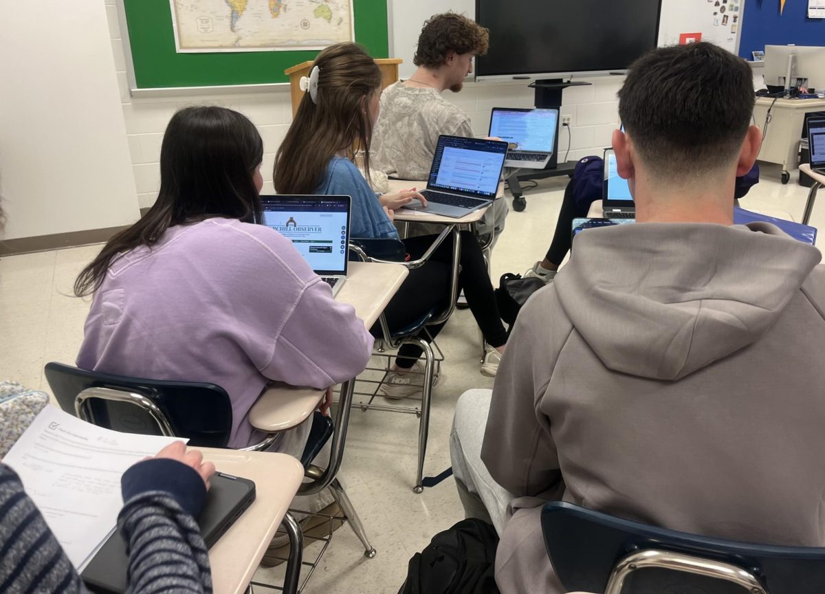 WCHS students work diligently on an AP Art History assignment. One goal of the increased out-of-school suspensions within MCPS is to promote a focused learning environment.
