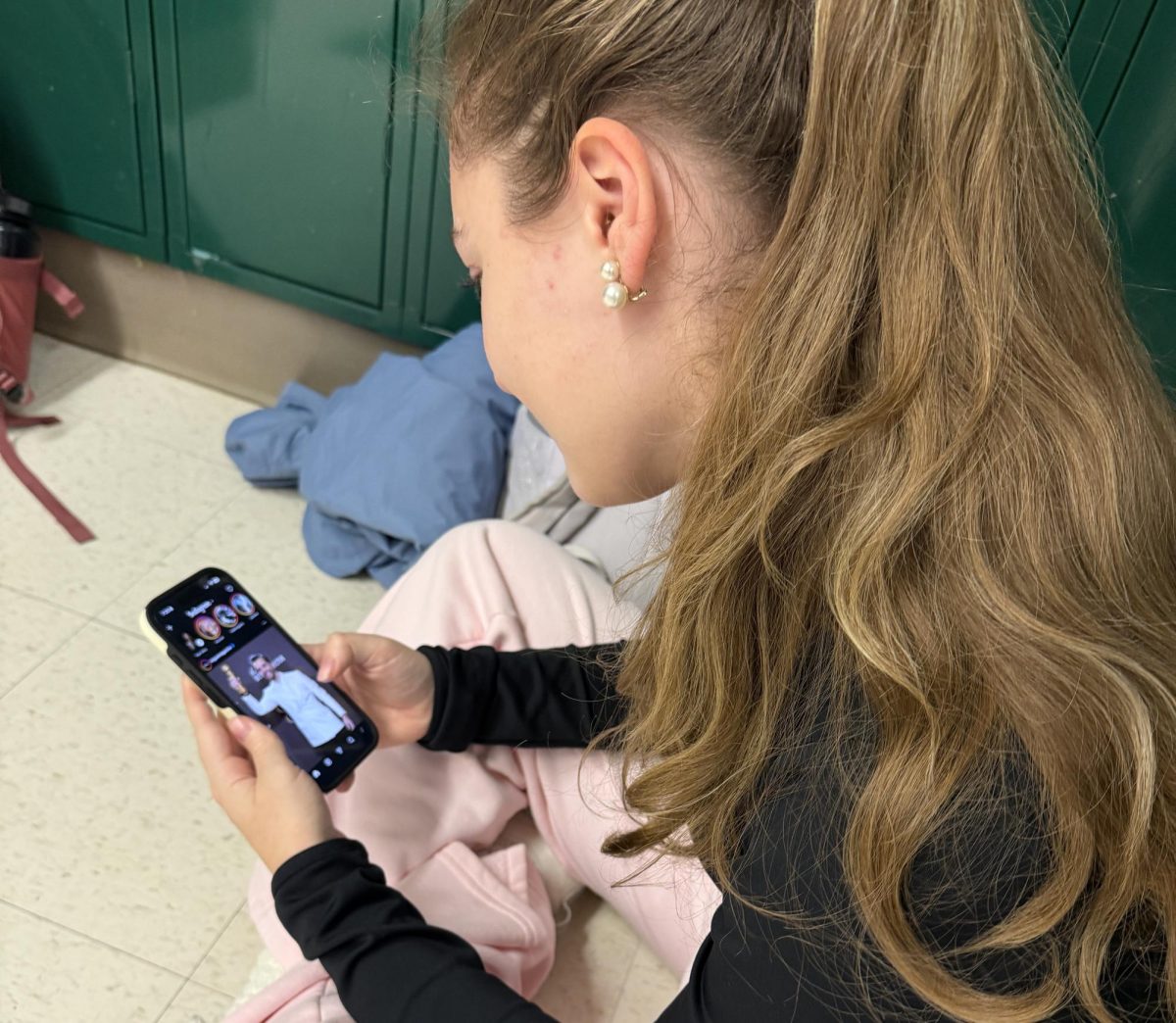 WCHS senior Alexandra Hall scrolls through Instagram before going to her first period. However, children under 16 would never be able to access Instagram due to the ban that they started in 2024. 