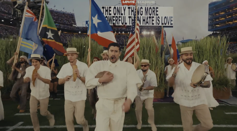 Bad Bunny’s 2026 Super Bowl halftime show featured a powerful display of Latin American unity, prominently featuring the flag of Puerto Rico (specifically a historical light-blue, independence-associated version) alongside a, likely 49-flag, parade representing nations across the Americas.