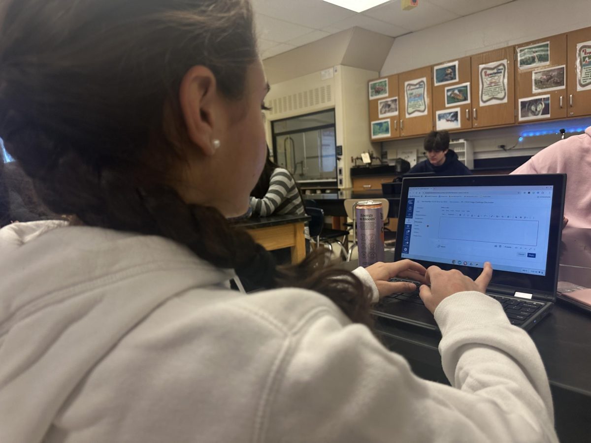 Senior Belen Rabade works on her Honors Nutrition class discussion in class for full credit, rather than waiting for a deadline to dictate when she completes her work.	