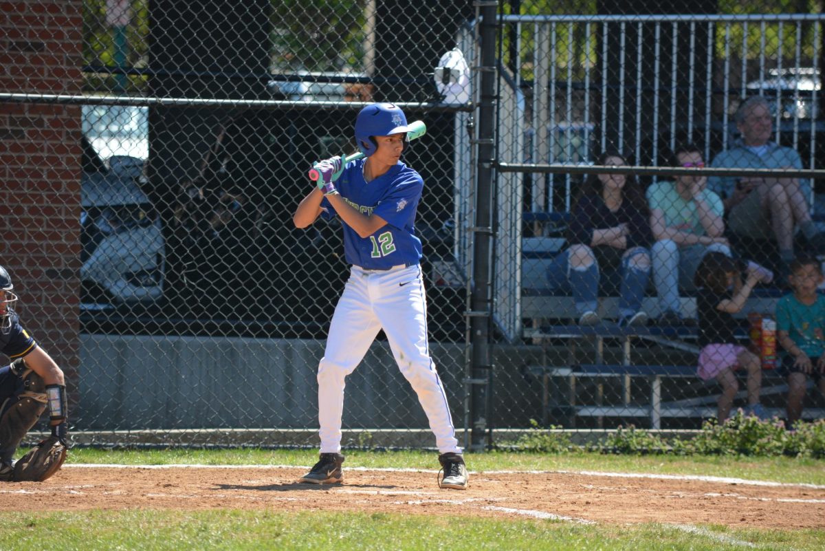 WCHS freshman Beckett Johnson gears up for a pitch in a J.V. game at B-CC on April 11, 2026. WCHS baseball players pay for all gear, except for the jersey shirt itself.