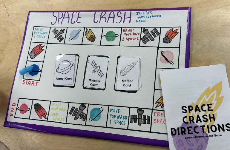 In Mrs. Rudnick's 4th period Engineering class, students are designing a variety of different games to help students who stutter. One group has created a space themed board game with creative cards.